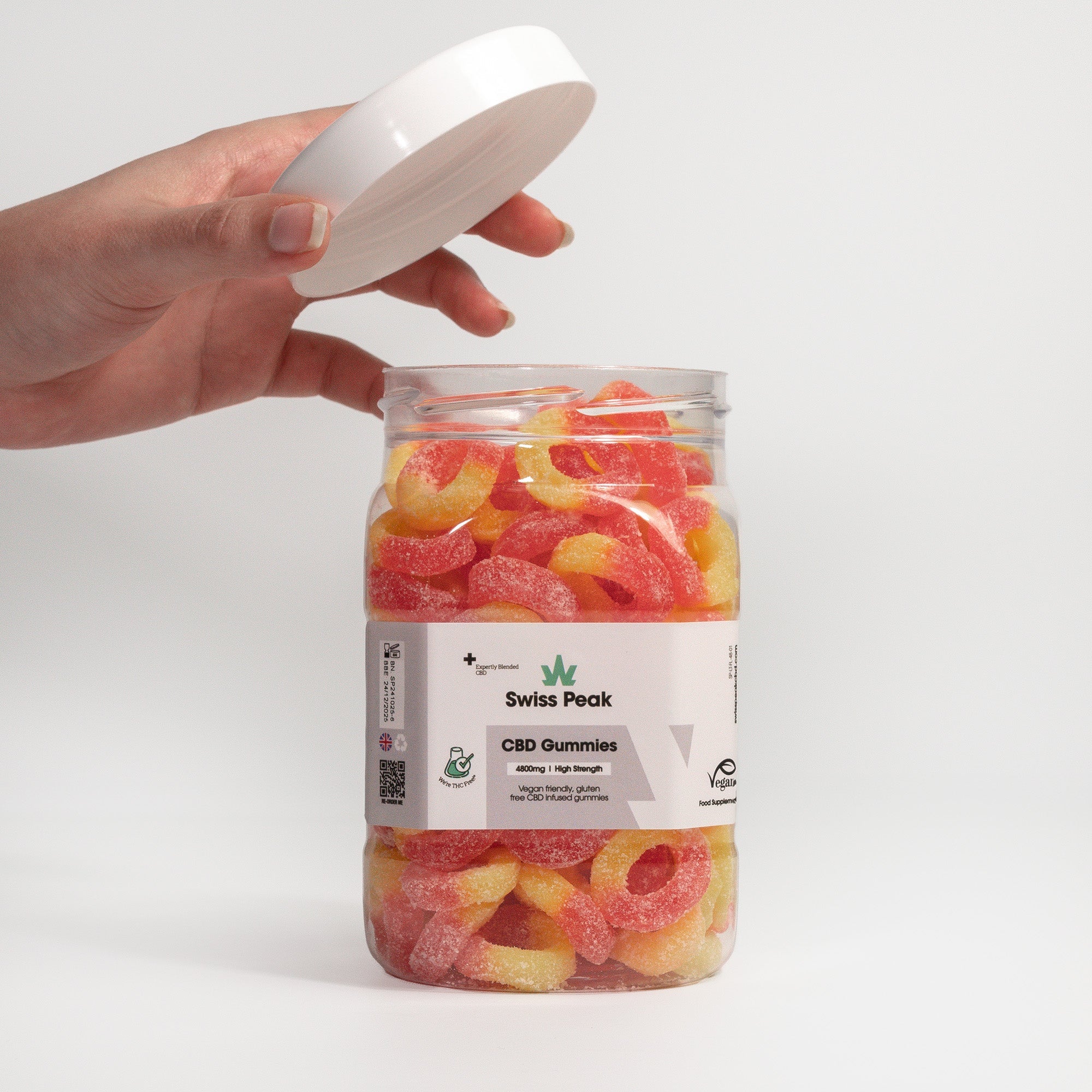 Opening a large tub of CBD Peach Ring Gummies 3200mg - 4800mg - Swiss Peak