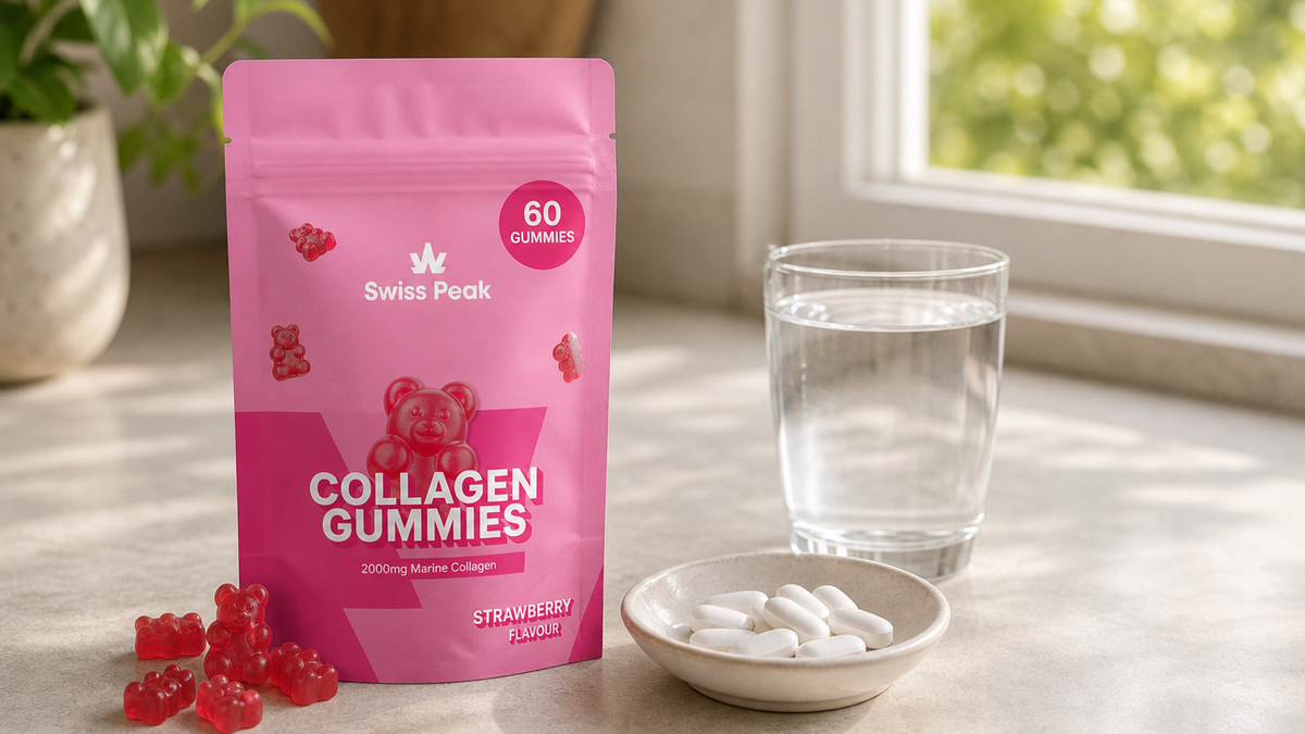 Swiss Peak Collagen Gummies pot and Marine Collagen Tablets bottle on a kitchen counter with a glass of water.
